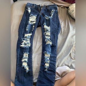Dark blue ripped jeans